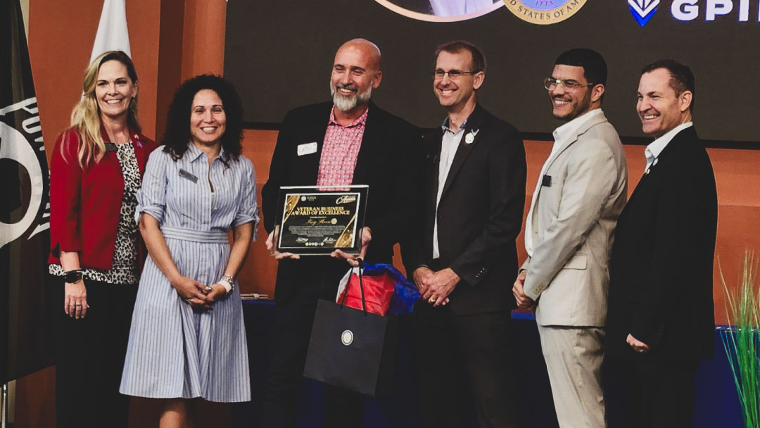 - GPI Defense GPI Defense receiving the Veteran Business Award of Excellence on stage at the Houston Regional Veterans Chamber of Commerce Awards.